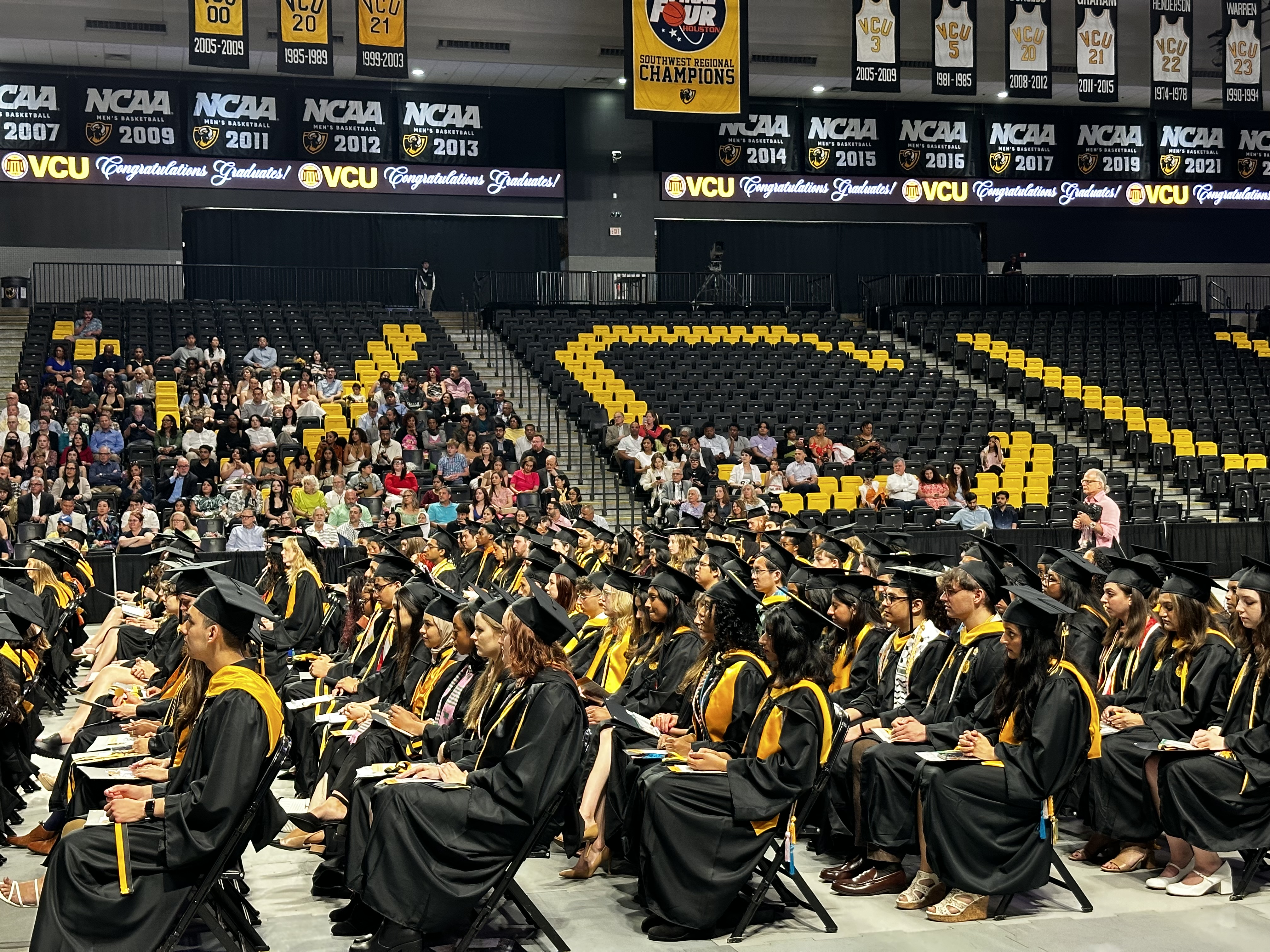 The Honors class of 2024 sits at the Siegel Center during the commencement address