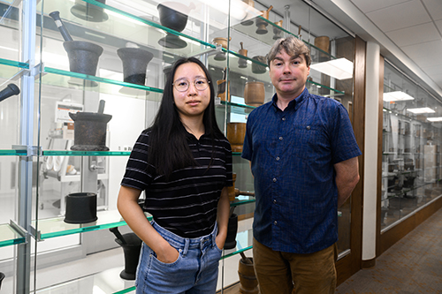Sunwoo Kim and Dr. Joseph McClay pose for a picture in the School of Pharmacy