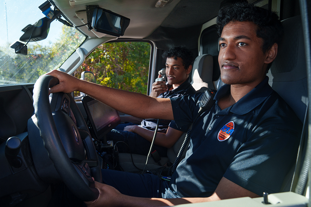 Arjun and Akash Jagdeesh in an ambulance